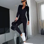 Dames Jumpsuit Aansluitend Sportief Met Rits en Gedurfde Strepen