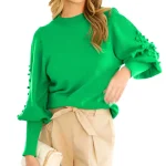 Dames Trui met Ballonmouwen en Pompon